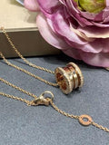 Bvlgari Rose Gold Spiral Circle Pendant Necklace – Elegant Luxury Jewelry