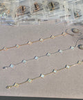 Van Cleef & Arpels Alhambra Mini 6-Motif Bracelet in White Mother-of-Pearl
