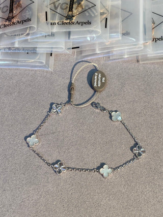 Van Cleef & Arpels Alhambra Mini 6-Motif Bracelet – White Mother-of-Pearl and Guilloché