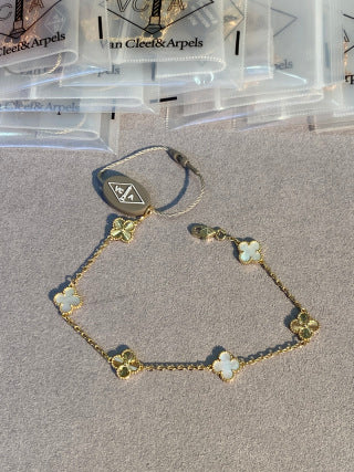 Van Cleef & Arpels Alhambra Mini 6-Motif Bracelet – White Mother-of-Pearl and Guilloché