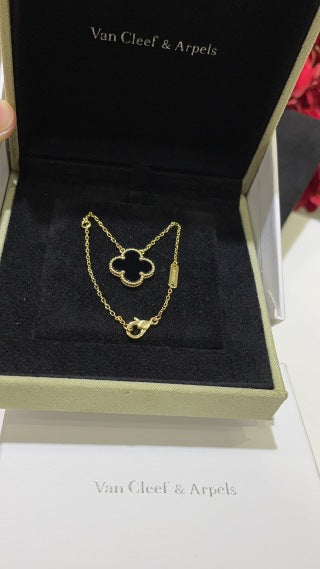 Van Cleef & Arpels Classic Gold Necklace with Black Onyx Four-Leaf Clover