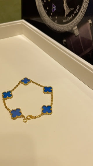 Van Cleef & Arpels 5-Motif Bracelet in Gold with Blue Agate Alhambra Motifs