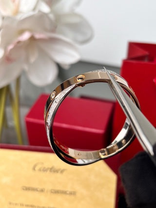 Cartier Love Entrelacé Pavé Crossover Bracelet