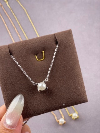 Cartier pearl and horn necklace