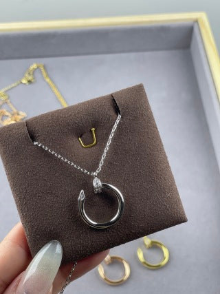 Cartier Juste un Clou necklace with diamonds at the head and tip