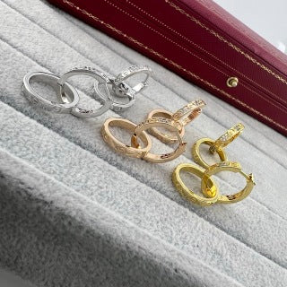 Cartier LOVE collection double-hoop earrings with screw motifs and half-set diamonds