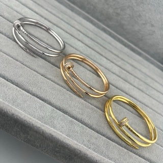 Cartier Juste un Clou bracelet, thick model, with diamonds at the ends and on the three-loop design.