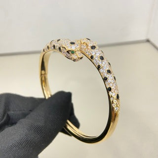 Cartier narrow-width, pavé-diamond double-headed panther bracelet
