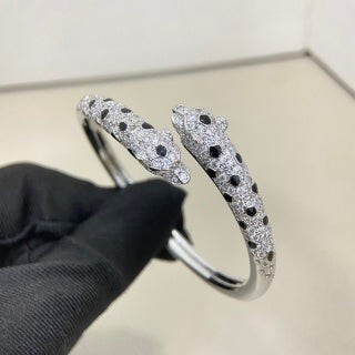 Cartier narrow-width, pavé-diamond double-headed panther bracelet