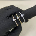 Cartier ring with a pear-shaped diamond center stone and diamond accents