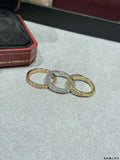 Cartier Panthère de Cartier ring, seven-row design, partially set with diamonds.