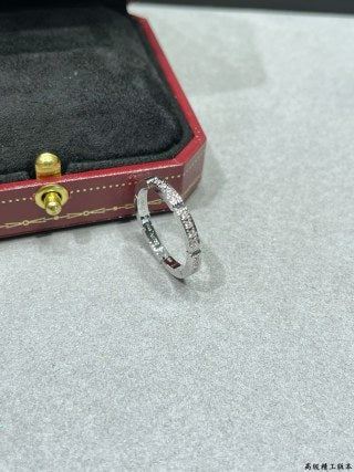 Cartier Panthère de Cartier ring, seven-row design, partially set with diamonds.