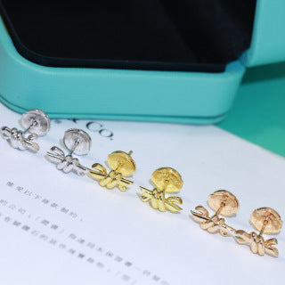Tiffany Knot Stud Earrings – Polished Gold-Tone Metal