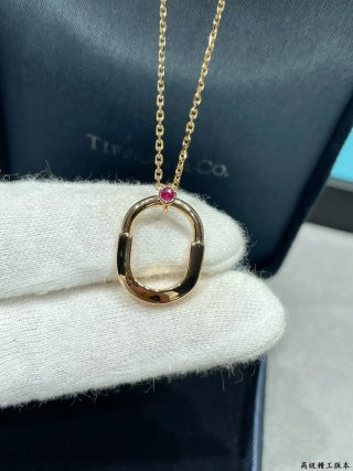 Tiffany Small Lock Necklace with a Single Pink Diamond