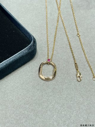 Tiffany Small Lock Necklace with a Single Pink Diamond