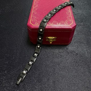 Cartier classic large white diamond with a carbon-black chain