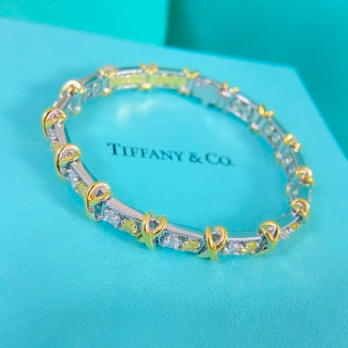 Tiffany & Co. rose gold multi-link flexible bracelet with diamond-set cross motifs