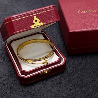 Cartier Valora Screw Detail Gold Cuff Bracelet