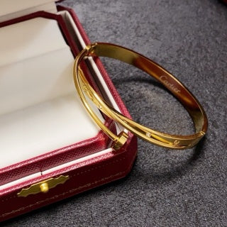 Cartier Valora Screw Detail Gold Cuff Bracelet