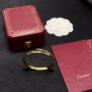 Cartier Valora Screw Detail Gold Cuff Bracelet