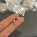 Cartier Solitaire Diamond Stud Earrings