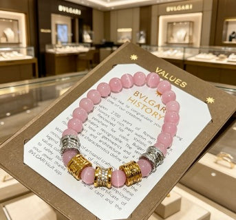 Bvlgari Pink Beaded Gold Accent Bracelet – Elegant Luxury Jewelry