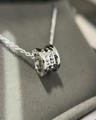 Bvlgari Silver Geometric Circle Pendant Necklace – Elegant Luxury Jewelry