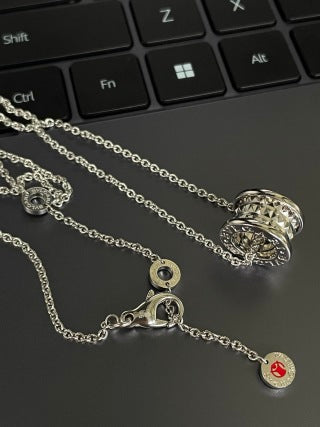 Bvlgari Silver Geometric Circle Pendant Necklace – Elegant Luxury Jewelry