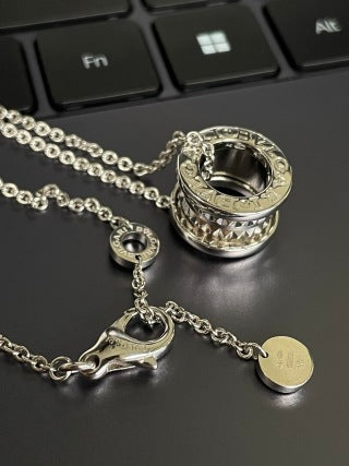 Bvlgari Silver Geometric Circle Pendant Necklace – Elegant Luxury Jewelry