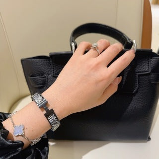 Hermès Clic H Noir Zebra Enamel Bracelet