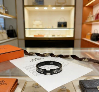 Hermès Clic H Noir Zebra Enamel Bracelet