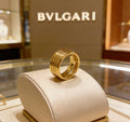Bvlgari Gold Multi-Layer Band Ring – Elegant Luxury Jewelry