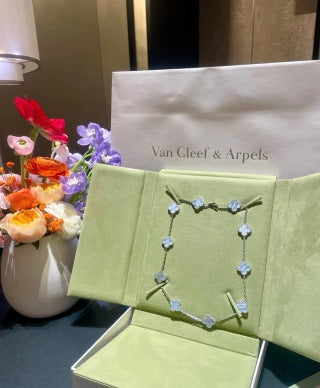Van Cleef & Arpels 10-motif necklace in white gold and purple chalcedony