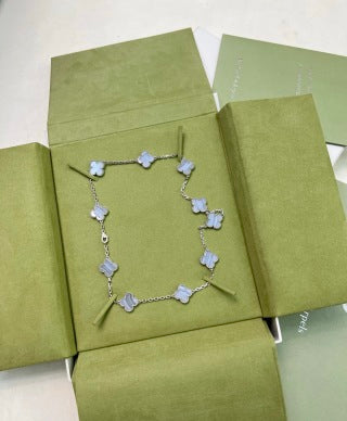 Van Cleef & Arpels 10-motif necklace in white gold and purple chalcedony