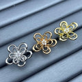 Van Cleef & Arpels Blooming Ribbon Flower Ring