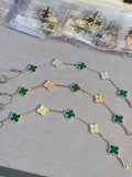 Van Cleef & Arpels Malachite 5-Motif Clover Bracelet with Gold-Tone Details