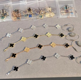 Van Cleef & Arpels 5-Motif Clover Bracelet with White Mother-of-Pearl, Black Onyx, and Gold-Tone Accents
