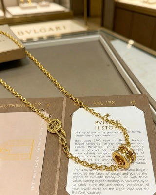 Bvlgari Gold Circle Pendant Chain Necklace – Elegant Luxury Jewelry