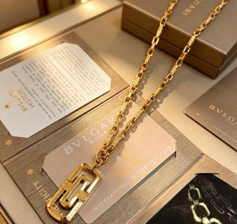 Bvlgari Gold Geometric Pendant Chain Necklace – Elegant Luxury Jewelry