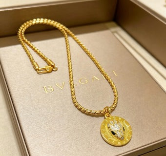 Bvlgari Gold Medallion Pendant Chain Necklace – Elegant Luxury Jewelry