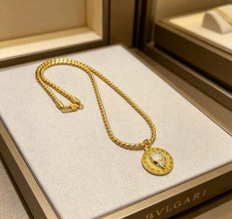 Bvlgari Gold Medallion Pendant Chain Necklace – Elegant Luxury Jewelry