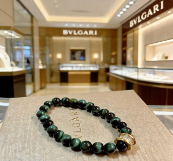 Bvlgari Green Gemstone Beaded Bracelet with Gold Accent – Elegant Luxury Jewelry