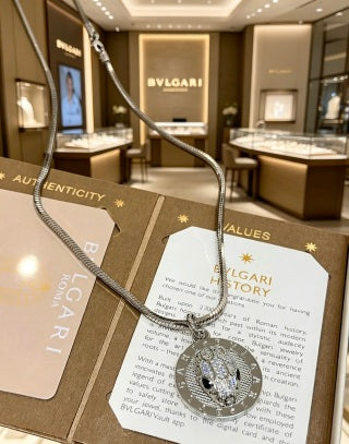 Bvlgari Silver Medallion Pendant Necklace – Elegant Luxury Jewelry