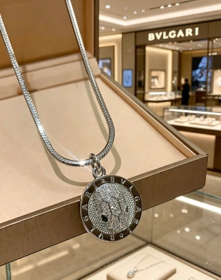 Bvlgari Silver Medallion Pendant Necklace – Elegant Luxury Jewelry