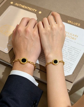 Bvlgari Gold Black Onyx Accent Link Bracelet – Elegant Luxury Jewelry