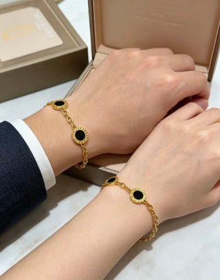 Bvlgari Gold Black Onyx Accent Link Bracelet – Elegant Luxury Jewelry