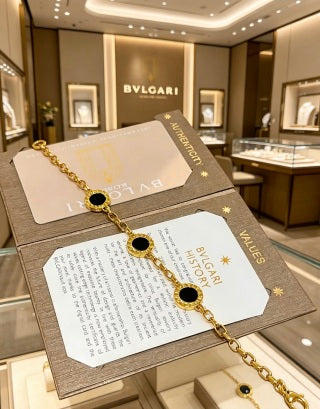 Bvlgari Gold Black Onyx Accent Link Bracelet – Elegant Luxury Jewelry