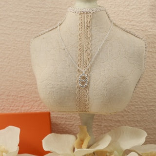 Hermès Beaded Oval Loop Pendant Necklace