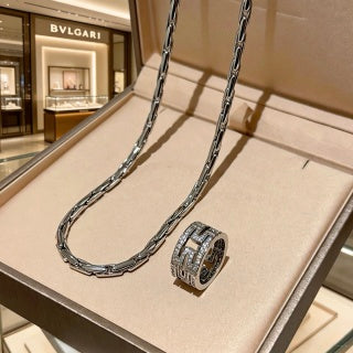Bvlgari Silver Spiral Ring Pendant Necklace – Elegant Luxury Jewelry