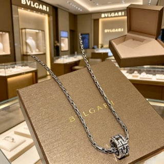 Bvlgari Silver Spiral Ring Pendant Necklace – Elegant Luxury Jewelry